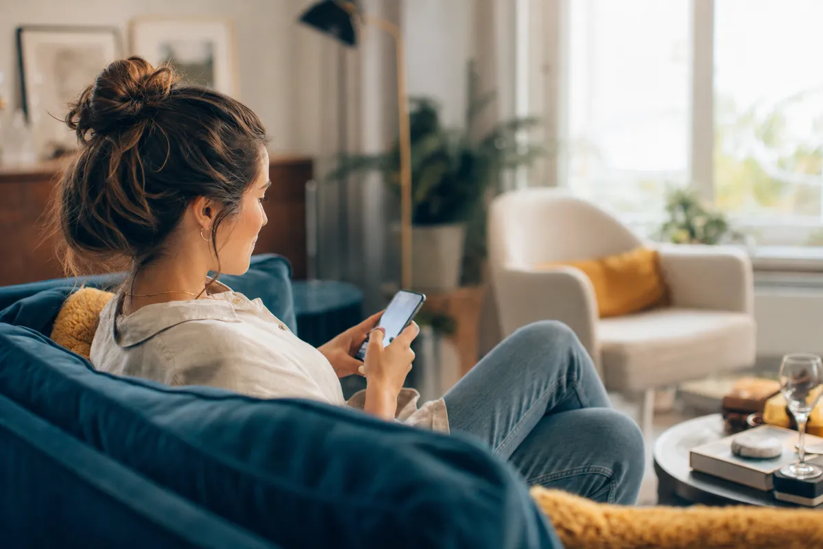 A person reviewing a phone bill showing repeated robocalls
