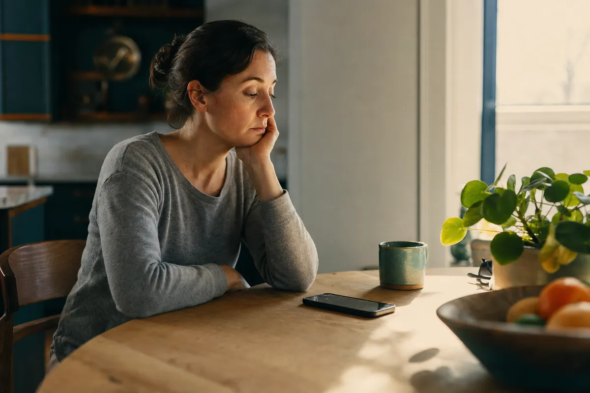 A person at home tired of constant unwanted robocalls